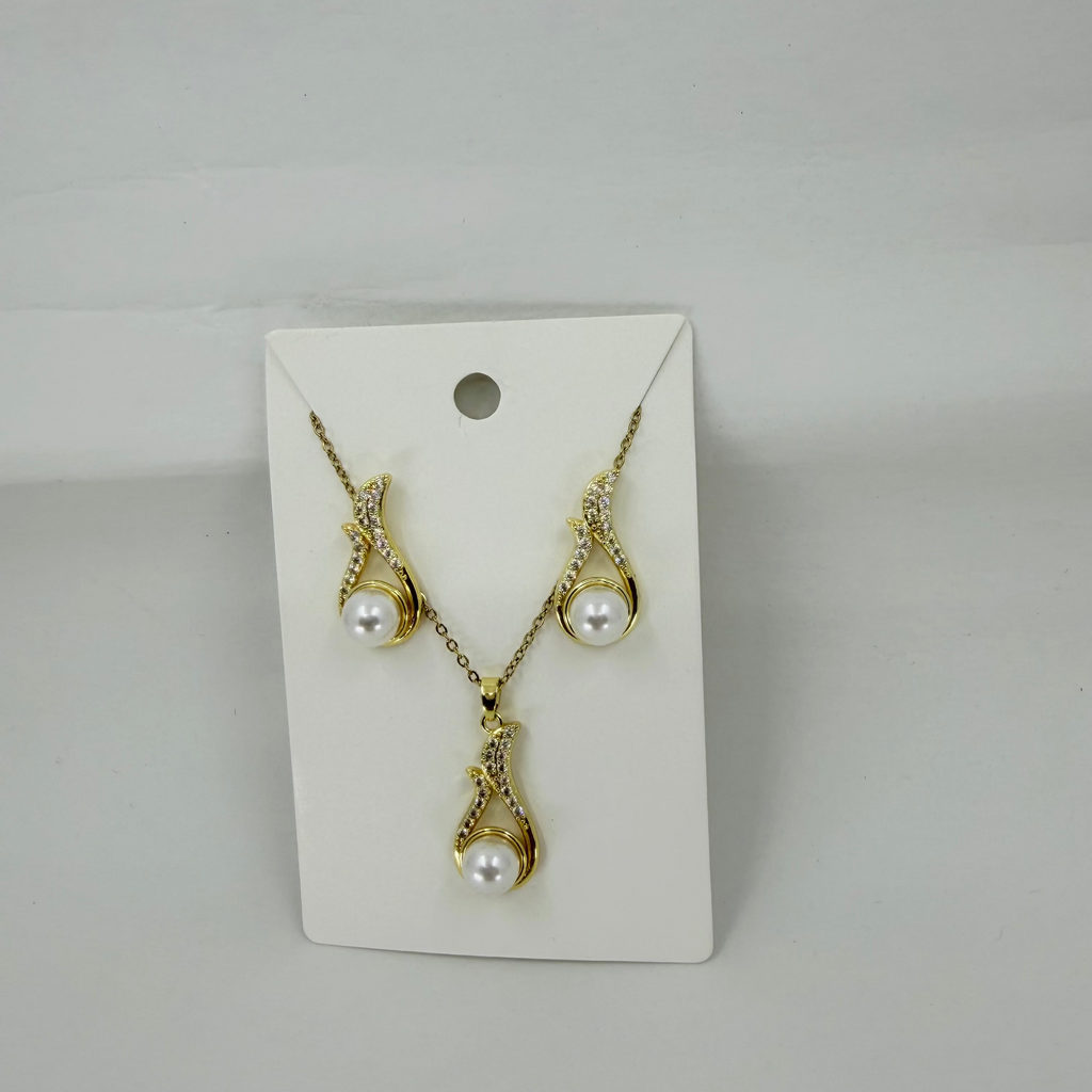 Shop Wholesale Gold-tone necklace and matching drop earrings with white faux pearls