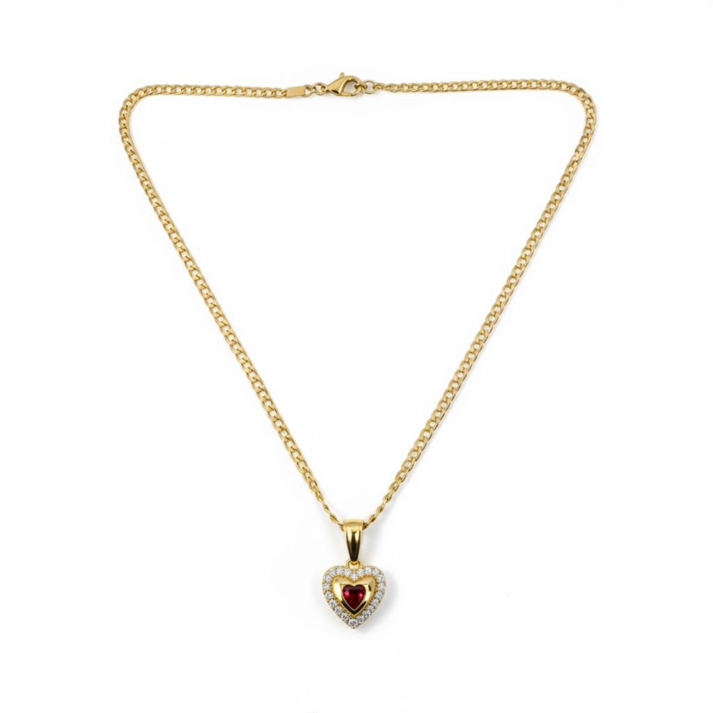 Gold necklace with a heart-shaped pendant on a white background