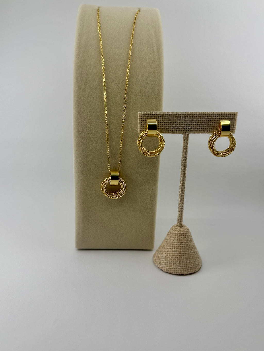 18K gold plated over brass, the Golden Circle Jewelry Set Earrings & Necklace,  brings effortless shine to a clean, modern design.