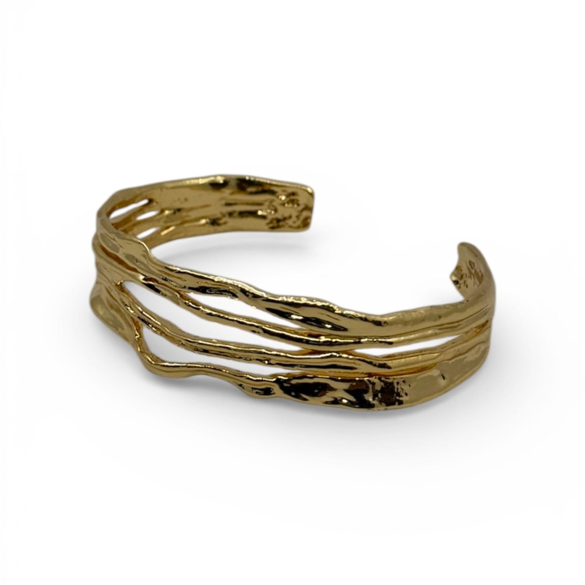 Gold bracelet on a white background