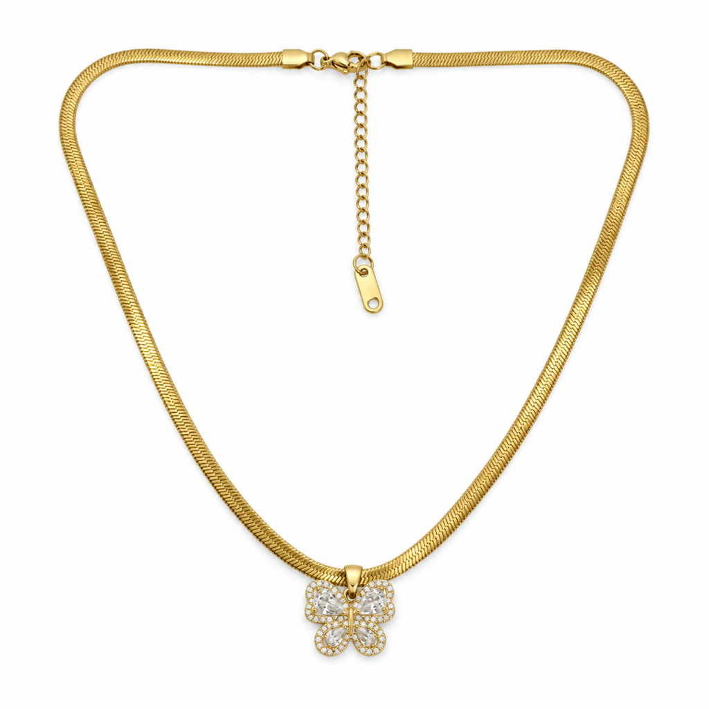 A gold snake chain necklace with a small butterfly pendant encrusted with clear Zirconia