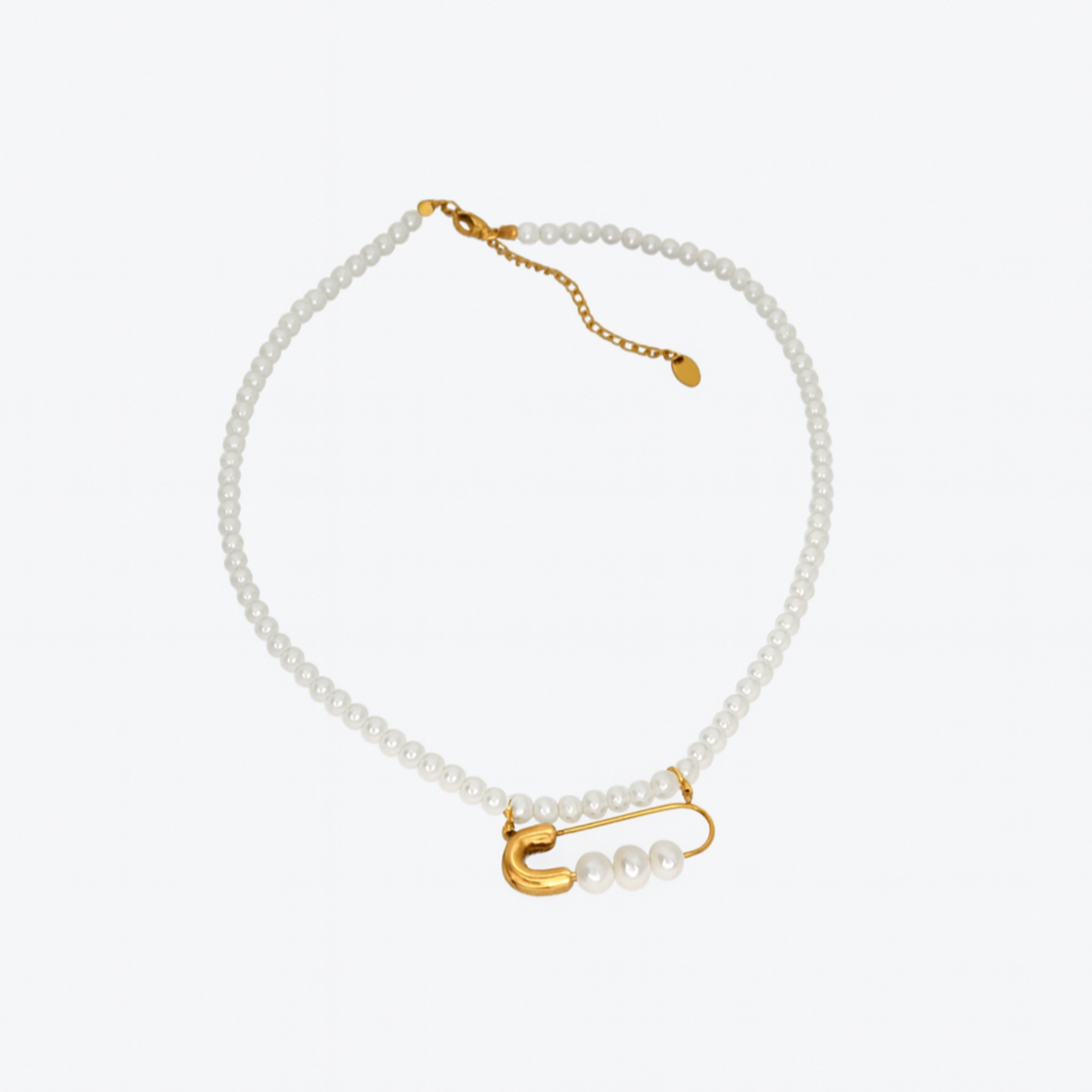 Pearl bracelet with gold clasp on a white background