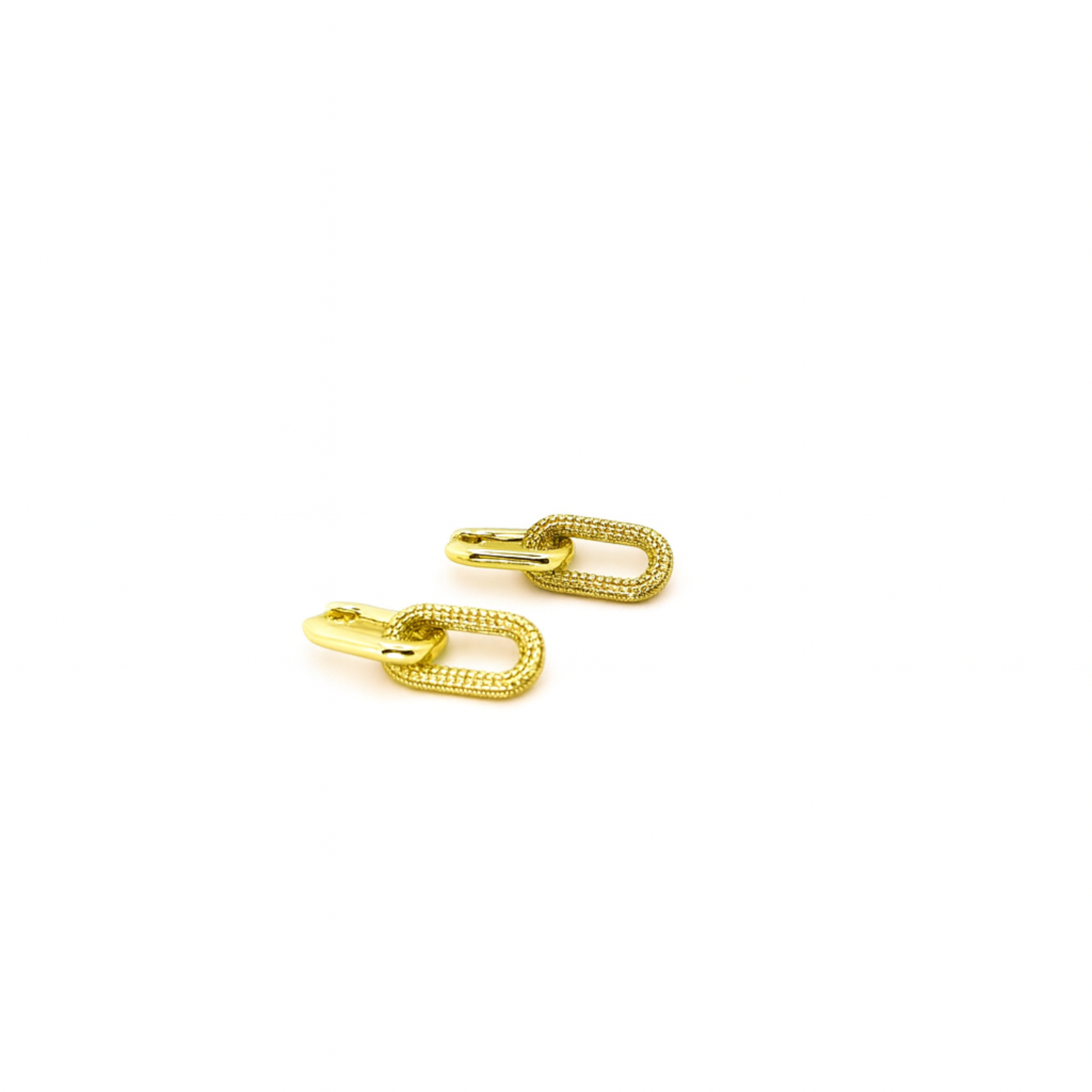Gold hoop earrings on a white background