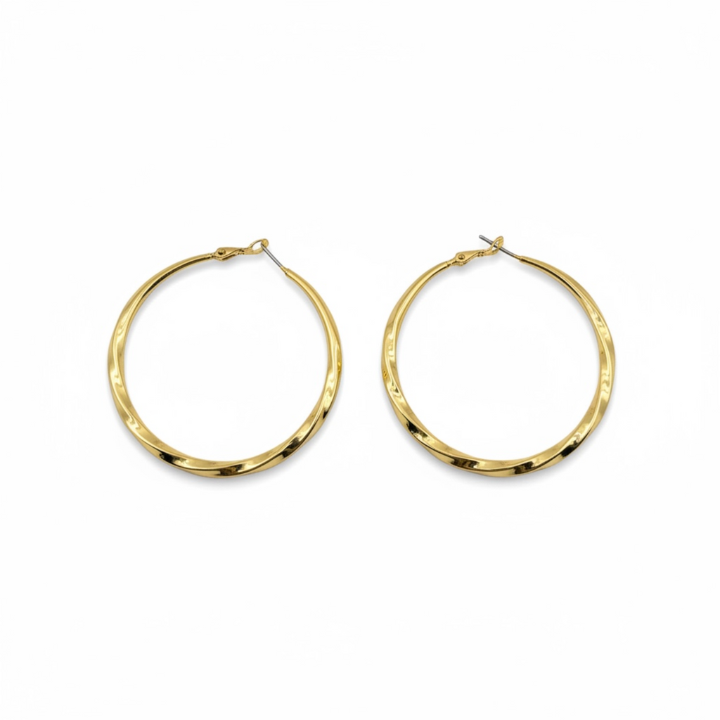 Gold hoop earrings on a white background