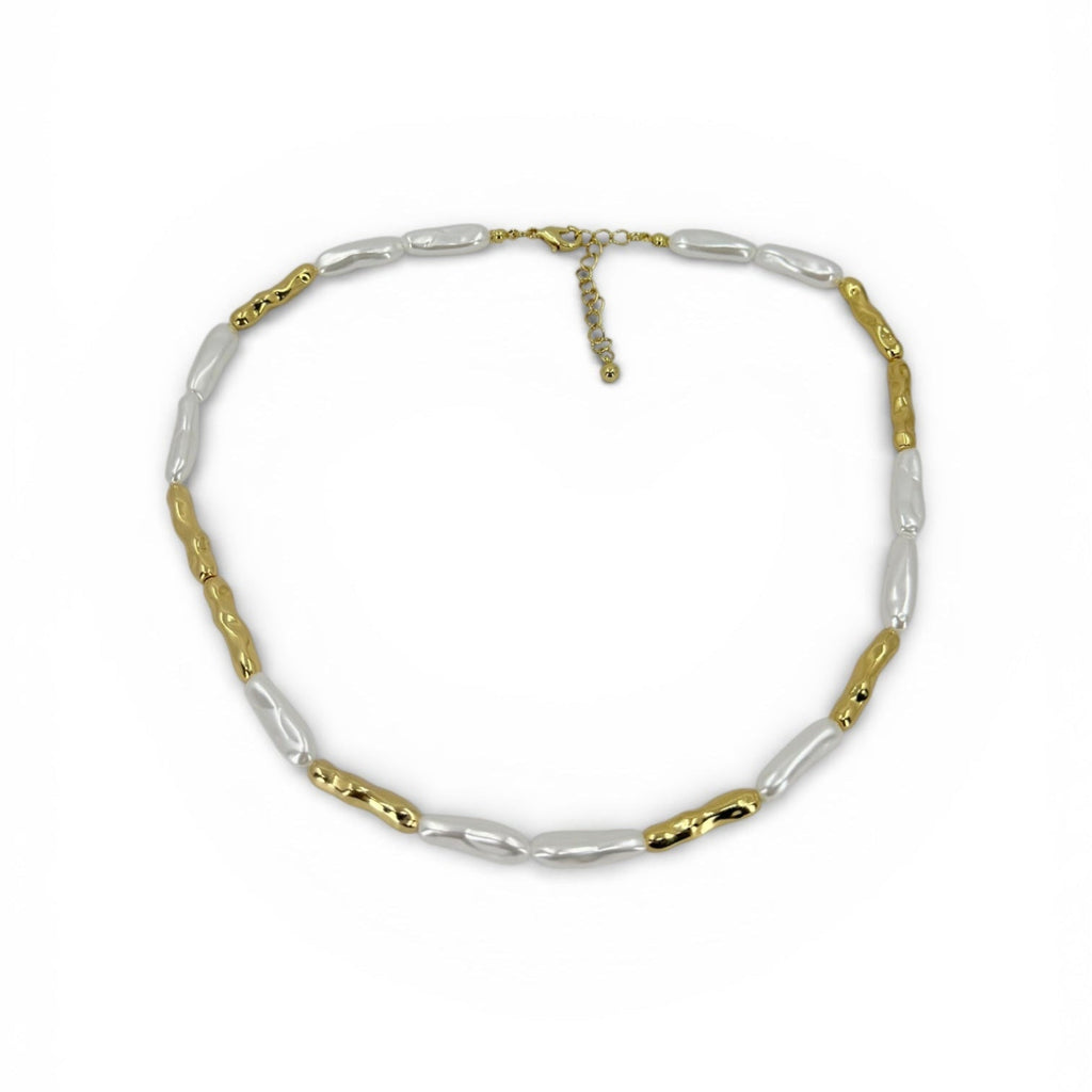 18K gold plated over brass, the Liquid Pearl Beaded Necklace offers a modern take on classic elegance.