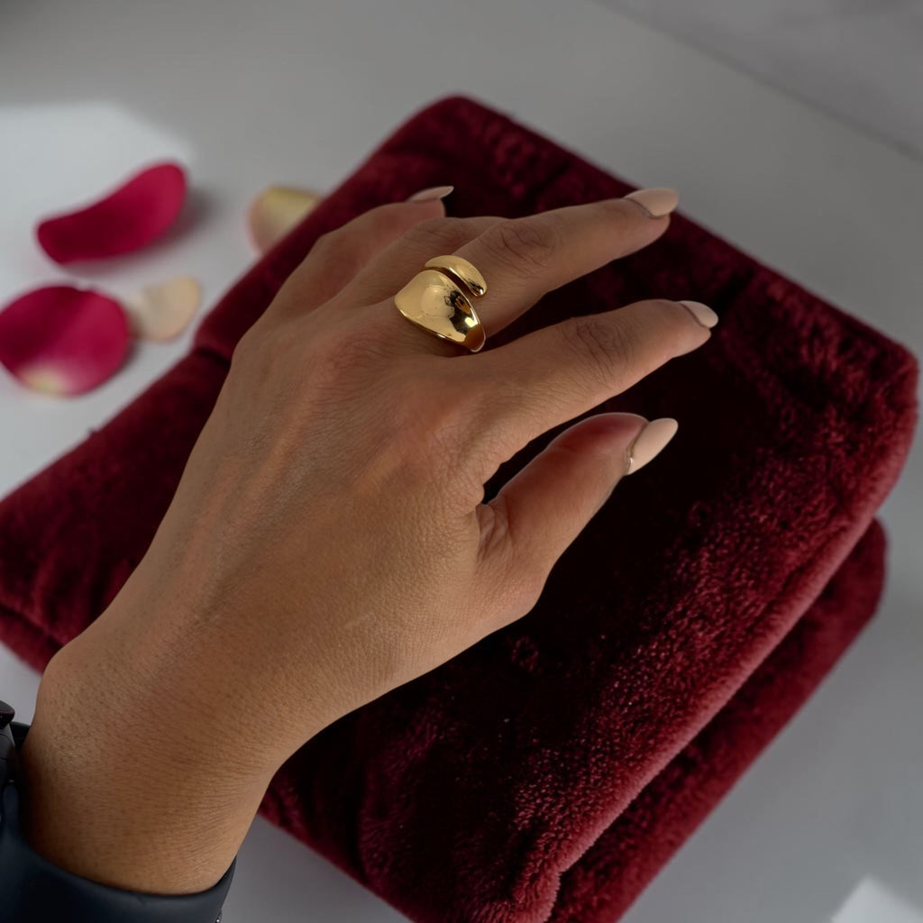 Hand wearing Golden Smooth Wrap Ring Elegant Wear