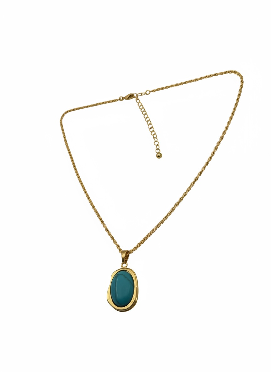 "Close-up of turquoise pendant and lobster clasp"