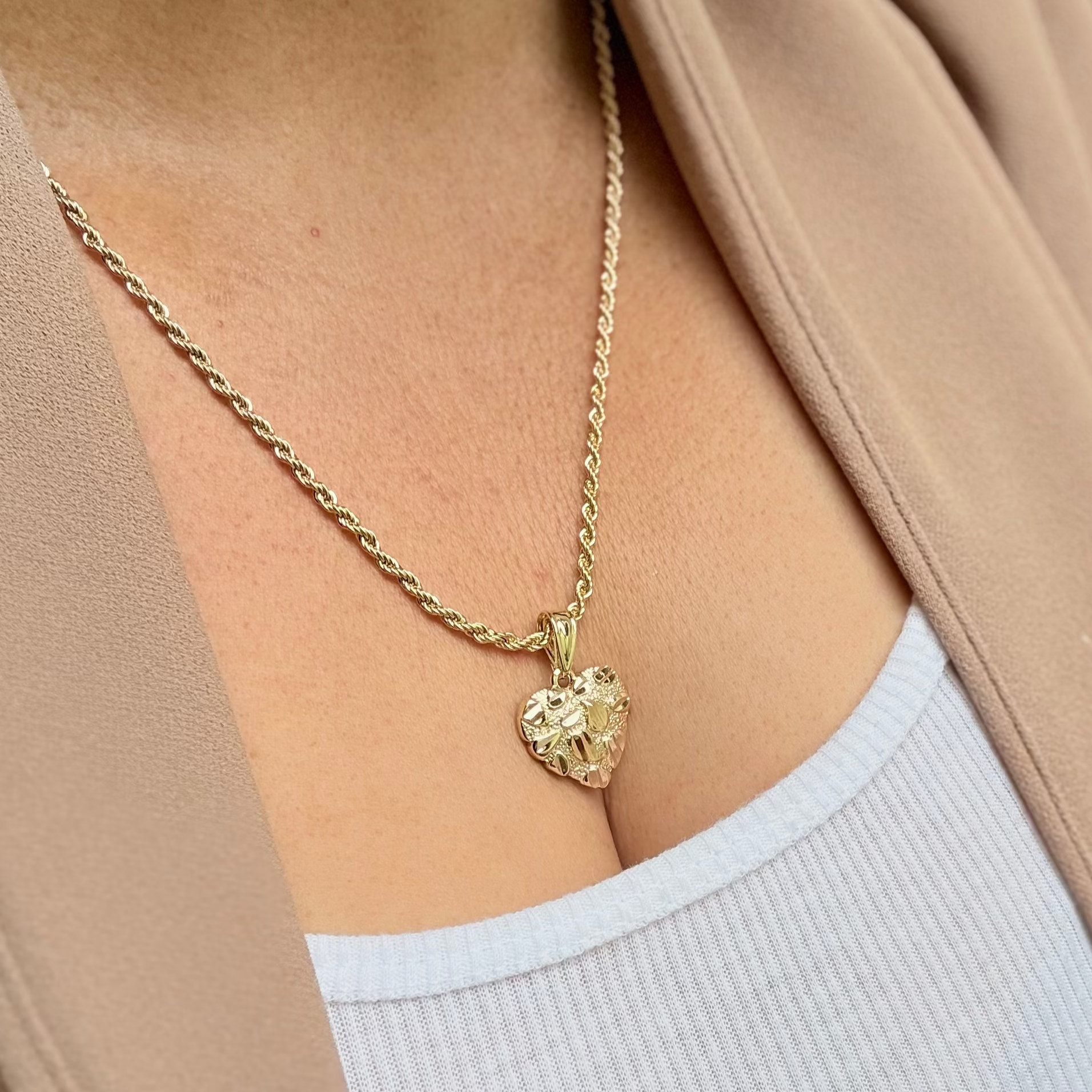Costumer wearing our nugget heart  pendant  necklace